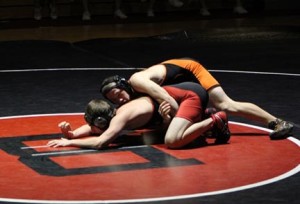 Jacob Troutman (152lbs.) uses a tight waist to control his opponent