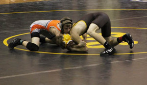 (Photos by Kenn Staub) Alex Struble (106lbs.) preventing his opponent from gaining an advantage
