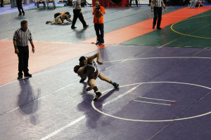 (Photo provided by the Smiths) Ben taking a shot on an opponent at States