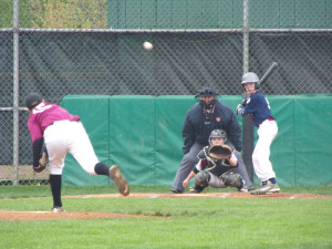 (Photo by Monica Goheen) Rotary's Curvin Giheen pitching to SMI's Christian Simko. Cam Lapinto is behind the plate.
