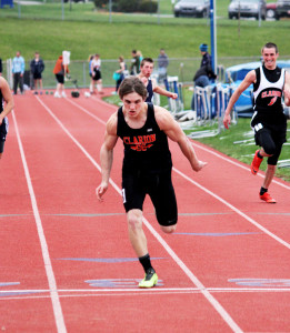 (Photo by G. Chad Thomas) Ian Corbett setting the Clarion Area 100 meter record