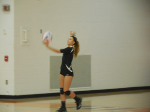Morgan Dehner serving to the Fire