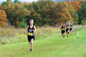 (Photo by Matt Lerch) Nathaniel Lerch leading JH Boys Race