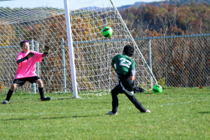 Evelyn Lerch launches the ball against the Meadville goalkeeper