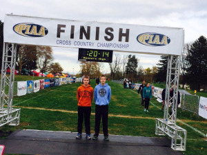 (Photo by Keith Murtha) Adam and Liam at the finish line