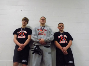 Three of the Bobcat place winners (L-R) Bryce Klawuhn 3rd at 155; Tom Wurster Champion at 210; Ben Smith 2nd at (165)  