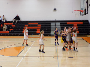 Lady Cats battling for the ball