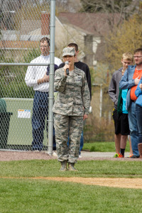 U.S.A.F. Senior Airman Vanessa Bartoe singing the National Anthem