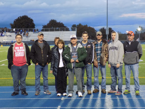 Tom and Family as he received an award from the Clarion Area Football Team this past fall.