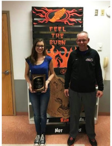 (Photo provided by CAHS) Katie Craig, with Coach Murtha who presented the plaque recognizing her as the first Clarion Area runner to compete in the State Cross Country meet