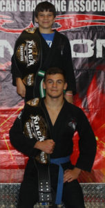 Mike and Haven LeFay holding their championship belts after the NAGA tournament