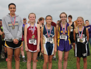 (Photos by Mark Bettwy) Champion Evelyn Lerch (on right) with other top five Junior High Girls placewinners