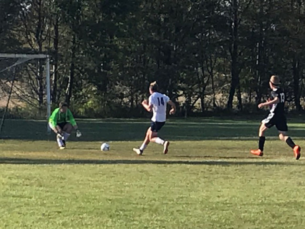 https://clarionsportszone.com/wp-content/uploads/2019/09/Soccer-2019-Beau-Verdill-moving-ball-in-on-East-Forest-Goalie-1050x788.jpg