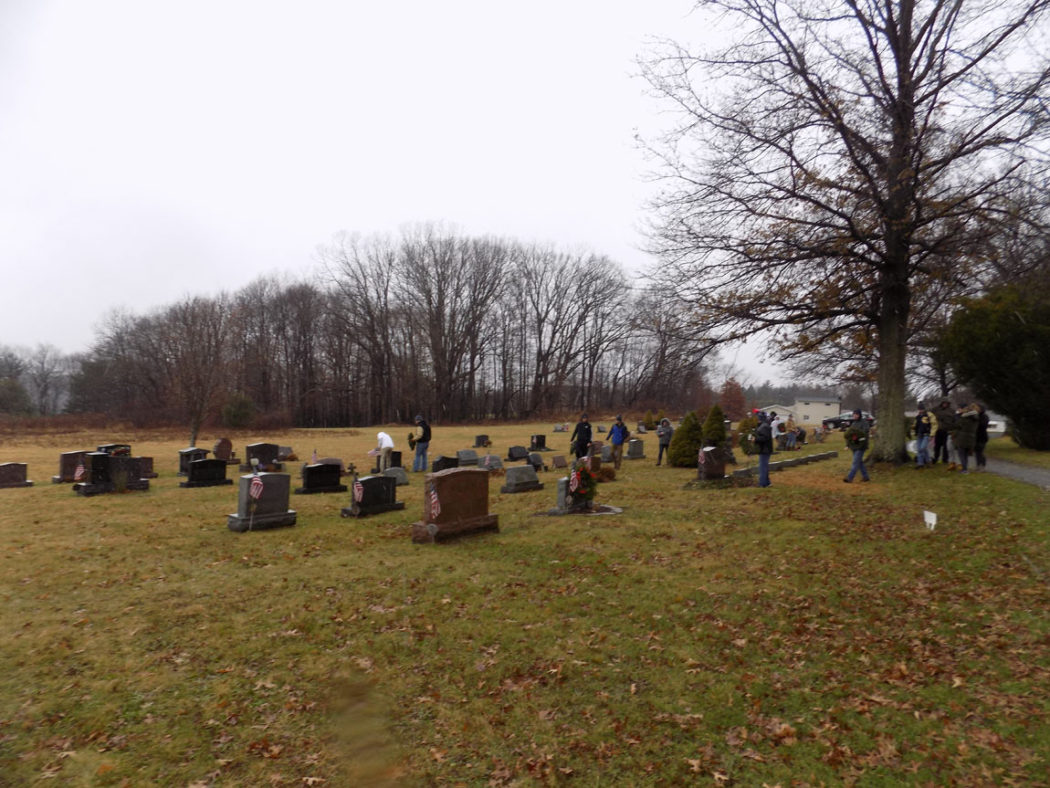 https://clarionsportszone.com/wp-content/uploads/2019/12/2019-Wreaths-Across-America-ceremony-S-Folks-laying-wreaths-1050x788.jpg
