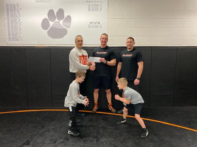 https://clarionsportszone.com/wp-content/uploads/2022/01/Wrestling-2021-2022-001-Janney-donation.jpg