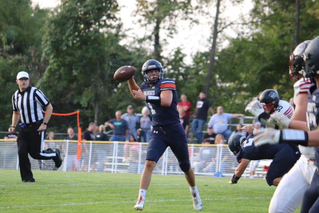 https://clarionsportszone.com/wp-content/uploads/2024/08/Football-2024-Brinley-Kiskadden-BK-Photography-4-Jase-Ferguson-looking-for-a-receiver-1050x700.jpg