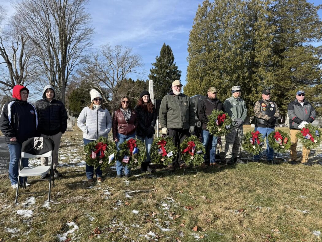 https://clarionsportszone.com/wp-content/uploads/2024/12/Wreaths-2024-Ceremony-7-Those-who-placed-service-branch-and-POW-MIA-Wreaths-and-POW-MIA-Chair-1050x788.jpg
